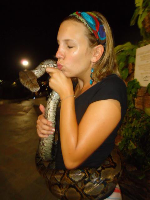 Get to kiss a snake. Gotta love to live your dream!