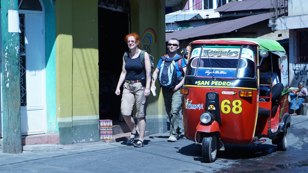 Tuk-tuks and tourists - a typical sight in San Pedro...