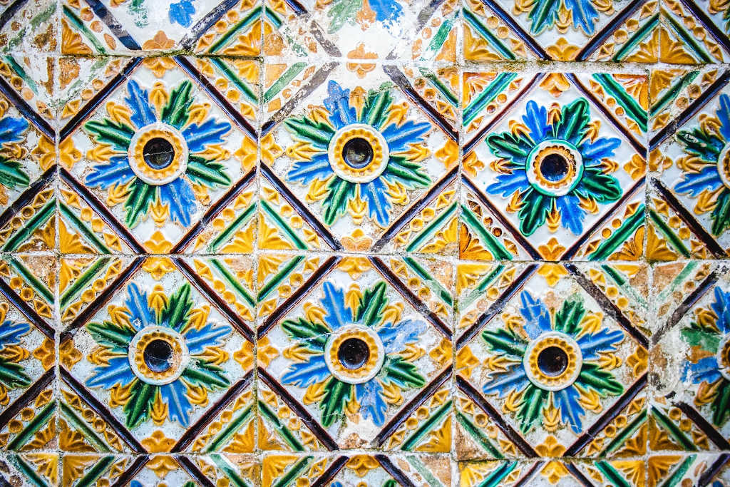 A wall of colorfully painted tiles in Portugal for Digital nomad families
